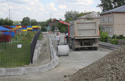 Строительство новой дороги идет в городе Тогучине